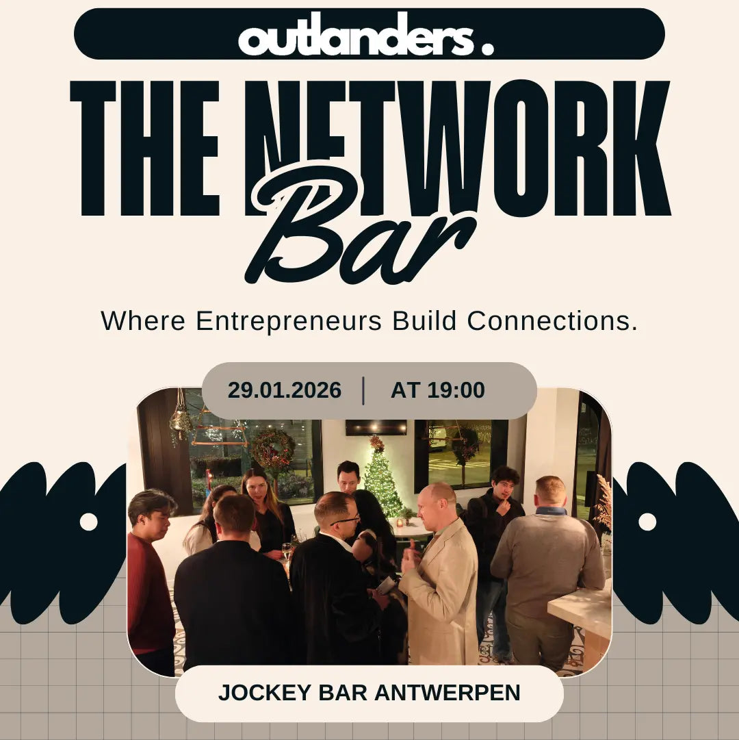 Entrepreneurs networking at a bar, drinks in hand